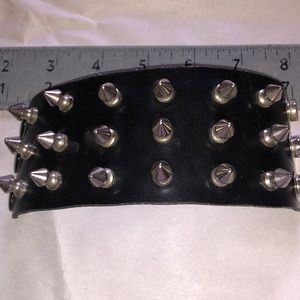 3 for $11 black triple row spike bracelet.